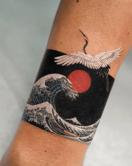 Red Sun, Flying Crane, and Kanagawa Waves Arm Tattoo