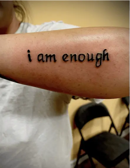 Big Hand Lettering I am Enough Arm Tattoo