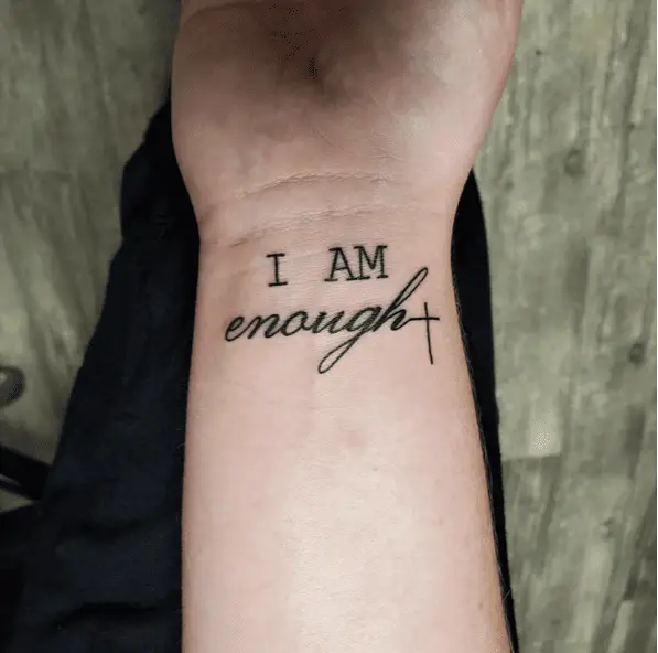 Script I am Enough With Cross Wrist Tattoo