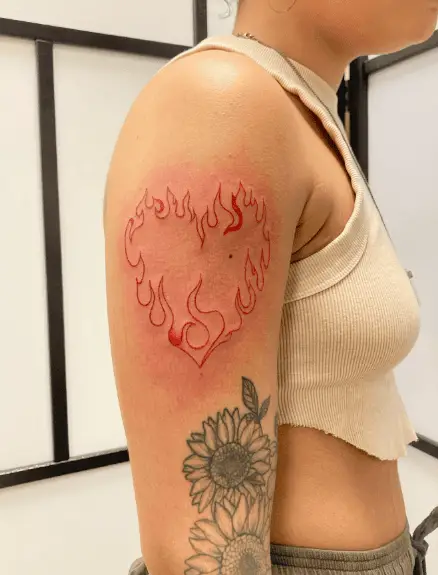 Flaming Red Heart Arm Tattoo