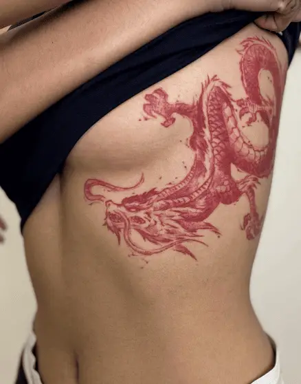 Red Ink Side Rib Tattoo Piece