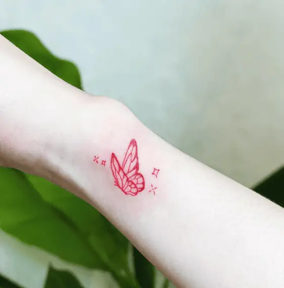 Red Ink Butterfly with Sparks Wrist Tattoo