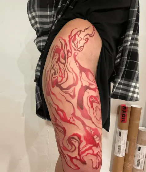 Red Ink Abstract Art Thigh Tattoo
