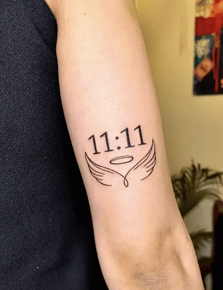 Single Line Angle Wing with 1111 Arm Tattoo