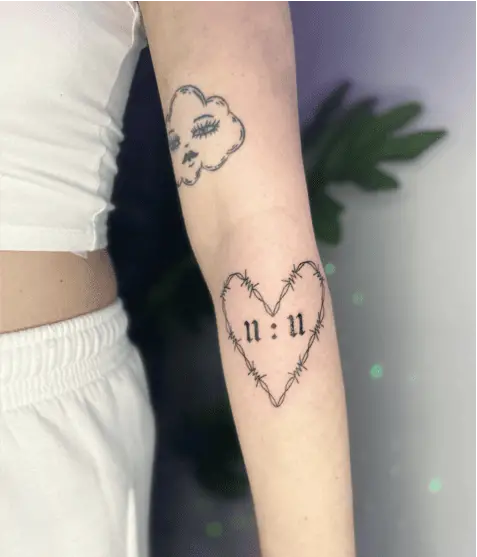 Heart Wired 1111 Arm Tattoo