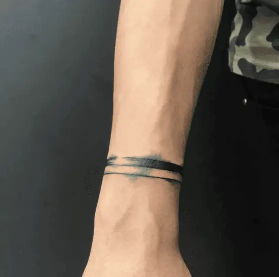 Black Brush Stroke Wristband Tattoo