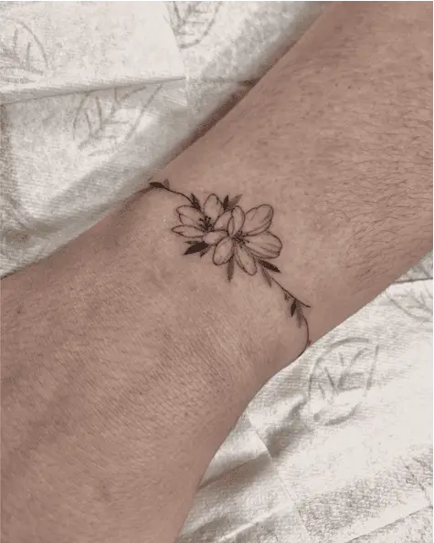 Two Flower Head and Leaves String Tattoo