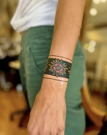 Colored Flower Head Traditional Wrist Cuff Tattoo