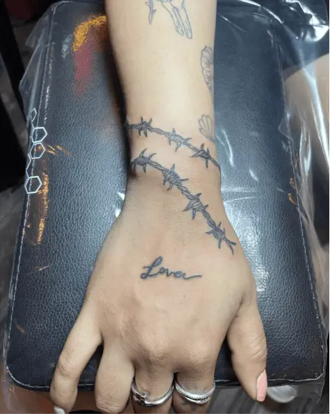Spiky Twisted Wired Wrist Tattoo