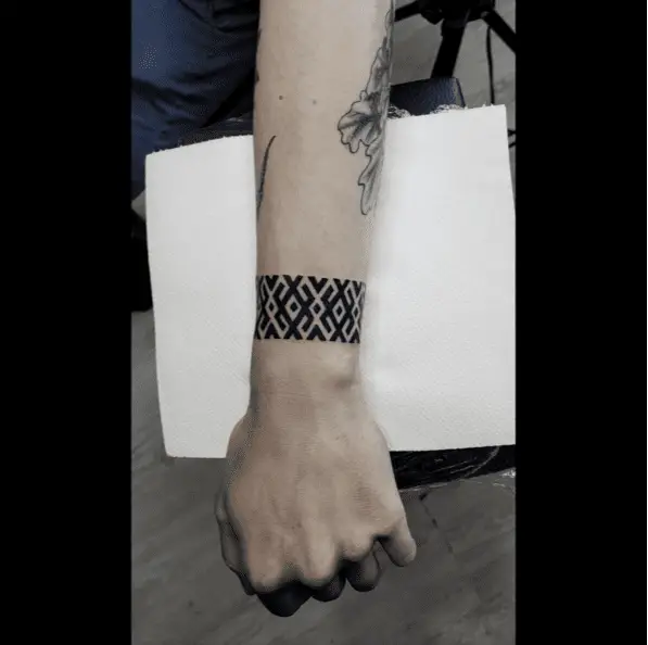 Black Geometric Pattern Wrist Tattoo