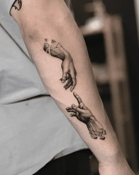 The Creation of Adam Forearm Tattoo