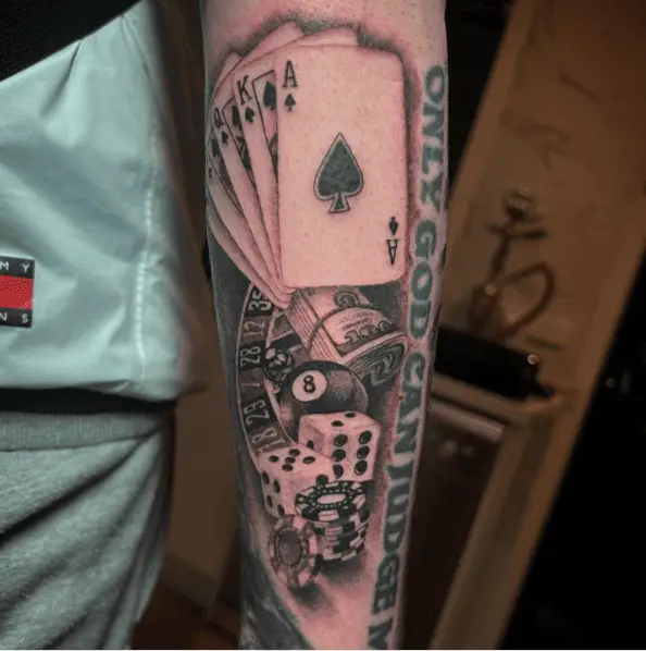Gambling Objects Themed Forearm Tattoo