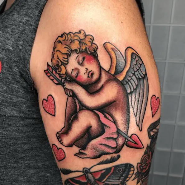 Sad and Sleeping Cupid with Hearts Tattoo 