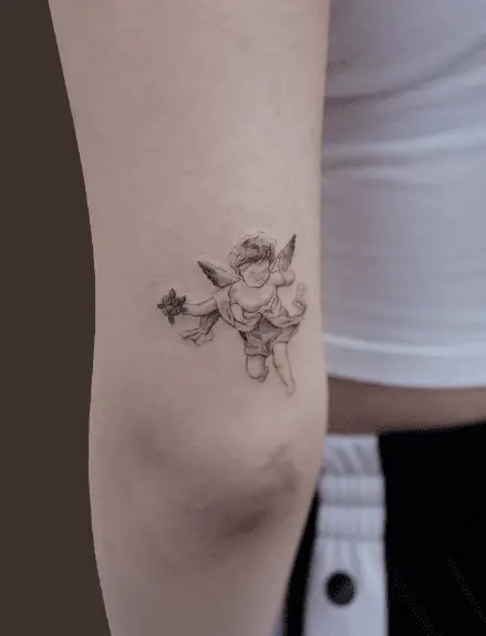 Small Cupid with Flowers Arm Tattoo