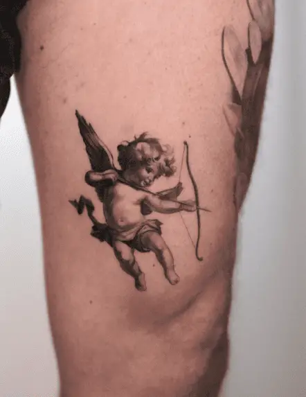 Greyish Baby Cupid Thigh Tattoo