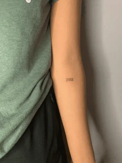 Simple and Small 2001 Forearm Tattoo