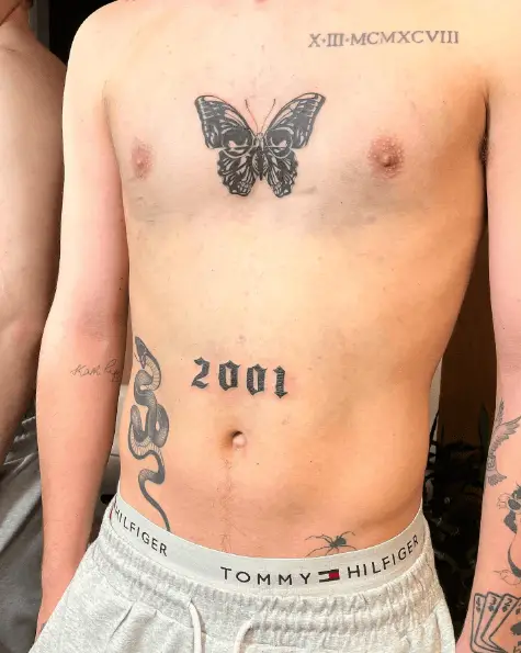 2001 Black Ink Stomach Tattoo