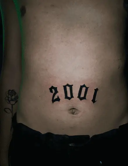 Bold Black Ink 2001 Stomach Tattoo
