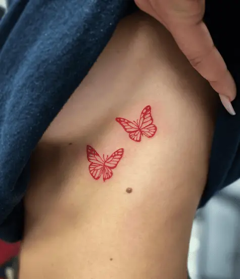 Red Ink Twin Butterflies Side Boob Tattoo