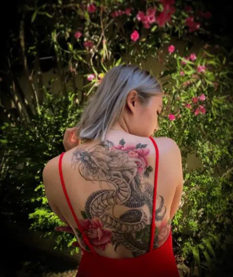 Colorful Peonies and Grey Ink Dragon Back Tattoo