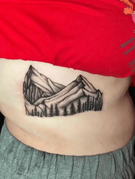 Sketch Style Mountain with Trees Rib Tattoo