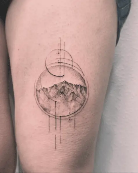 Circle Shaped Frame Mountain Thigh Tattoo