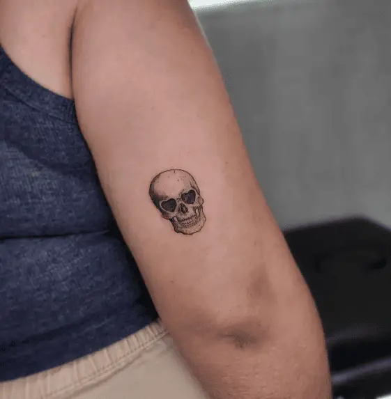 Tiny Skull Head Arm Tattoo