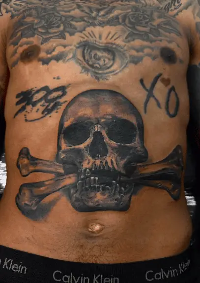 Greyish Skull Head and Crossbones Tummy Tattoo
