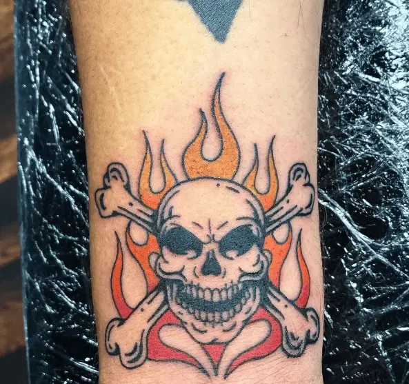 Little Flaming Skull and Crossbones Tattoo