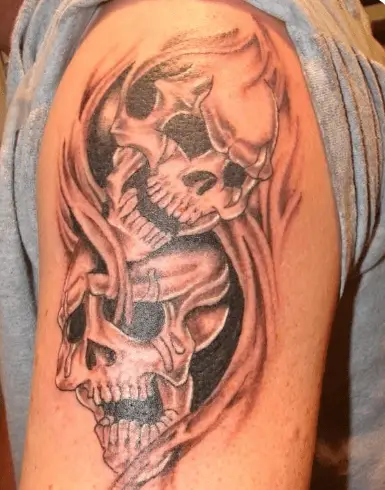 Black and White Crying Skull Bicep Tattoo