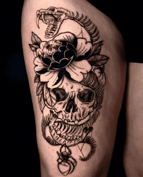Skull, Snake and Floral Thigh Tattoo