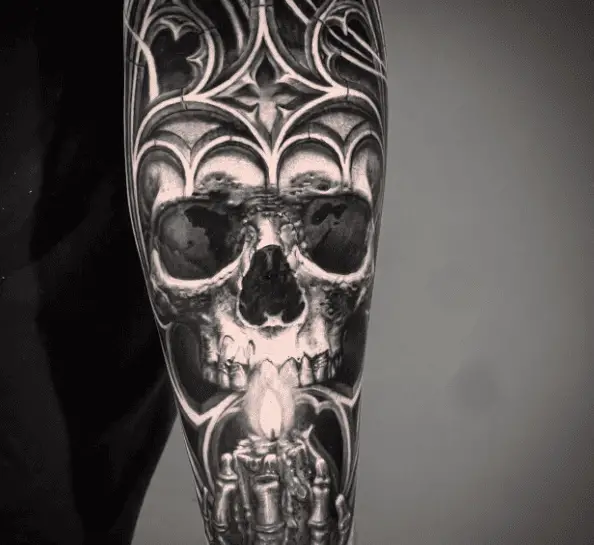 Skull Holding Candles Back Arm Tattoo