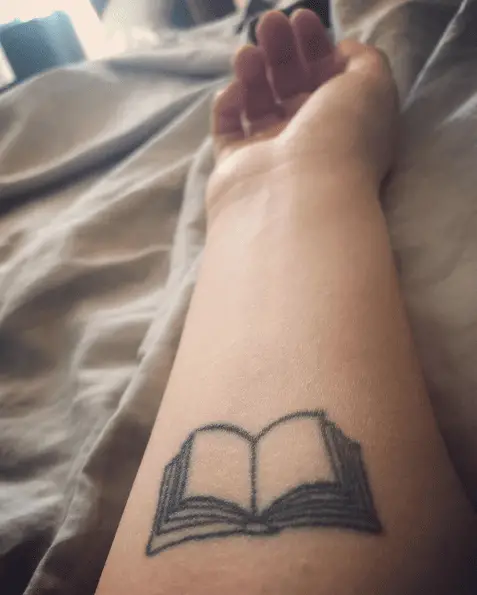 Small Open Book Forearm Tattoo