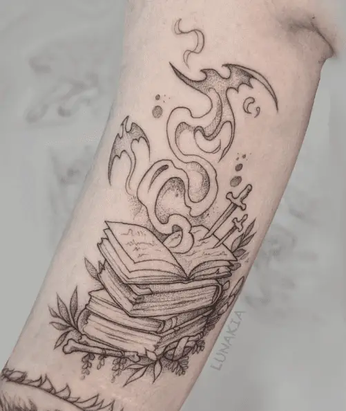 Stack of Books with Variety of Elements Tattoo