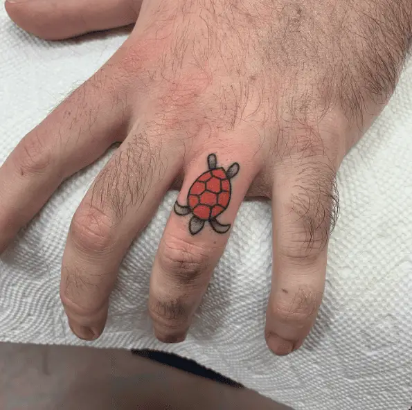 Colored Finger Turtle Tattoo
