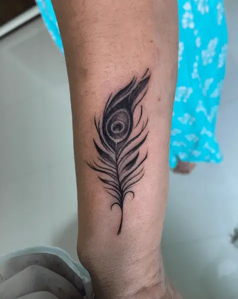 Black and Grey Peacock Feather Forearm Tattoo