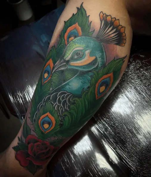 Green Ink Peacock head with Feathers Tattoo