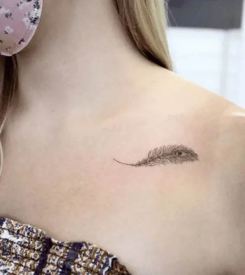 Tiny Grey Peacock Feather Collarbone Tattoo