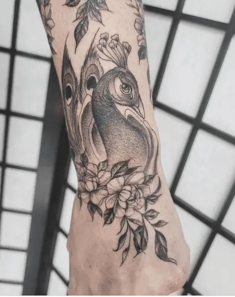 Sketch Style Peacock Head with Florals Tattoo