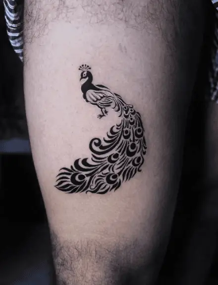 Designed Small Peacock Thigh Tattoo