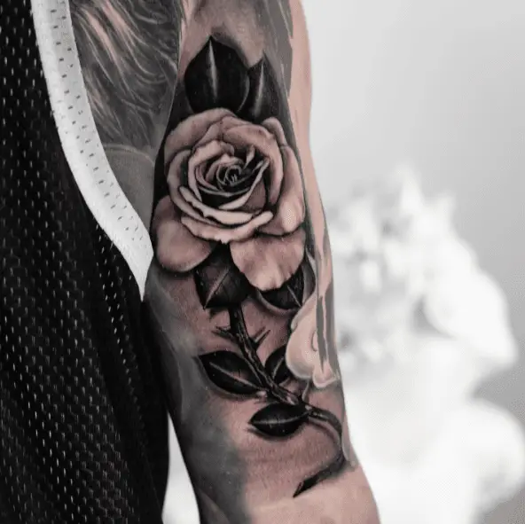 Dark Grey Rose Portrait Style Tattoo