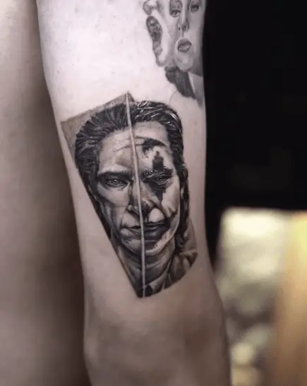 Joker Portrait Style Tricep Tattoo
