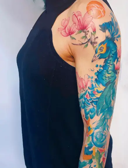 Watercolor Florals and Peacock Arm Tattoo