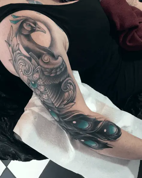 Grey Peacock with Bottle Green Feathers Arm Tattoo