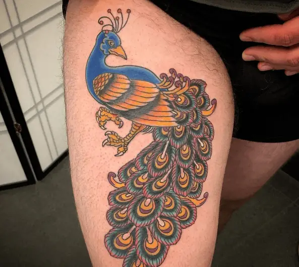 Yellow and Blue Peacock Thigh Tattoo