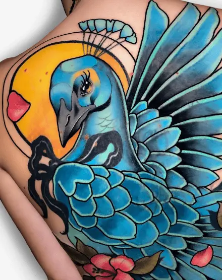 Vibrant Blue Peacock with Flowers Tattoo