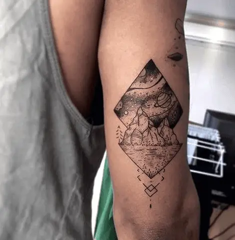 Space and Landscape Combined Geometrical Shaped Tricep Tattoo