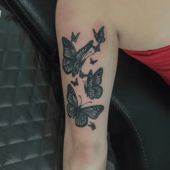 Group of Fluttery Butterflies Tattoo on the Tricep