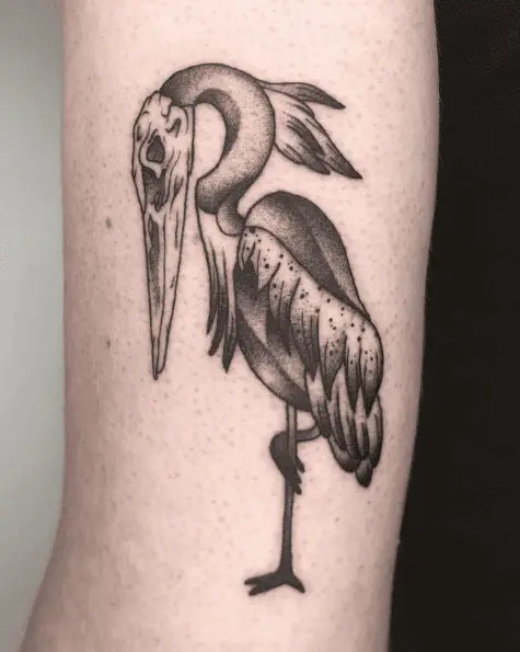 Skully Heron Tricep Tattoo