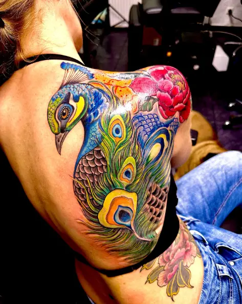 Multicolored Peacock and Flowers Back Tattoo